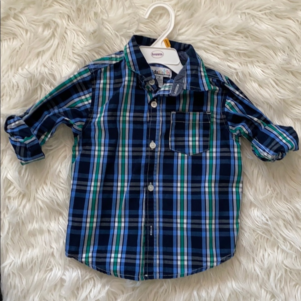 Lightly worn boy button down shirt.